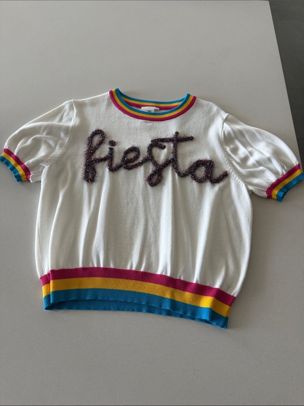 QUEEN OF SPARKLES White Knit Sweater with Rainbow Trim and 'fiesta' Script